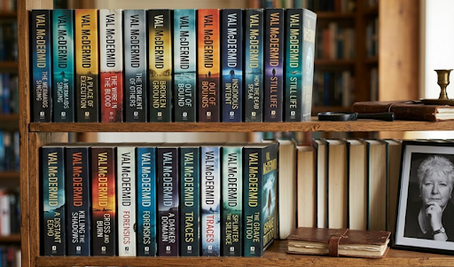 Val McDermid books on a library shelf with her portrait.